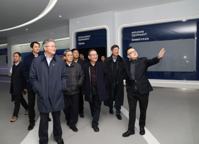 2020年12月16日时任浙江省经济与信息化厅厅长徐旭调研狗万官网